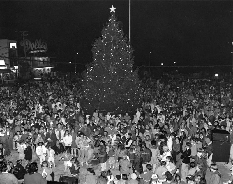 🎄Merry Christmas and Happy Holidays from the Rehoboth Beach Bandstand 🎵
Posted in this week's @capegazette, this historical image is one of many years of celebration, joy, and family gatherings at the Rehoboth Beach Bandstand. Our annual tree lighting attracts thousands each year and reminds us all of how special the holidays are to our families and friends. We wish you all a wonderful holiday season and look forward to many more years of happy memories in Rehoboth Beach.
CAPE GAZETTE: A Christmas tree at The Bandstand in Rehoboth Beach is a holiday tradition. This photograph appears to be taken in the early 1990s before the city undertook the years-long Rehoboth Avenue streetscape project. This image also predates the current Bandstand, which was built in 2006. Prior to that, the Bandstand faced the Atlantic Ocean, with the stage located about where the Veterans Memorial is today. The Christmas tree lighting and sing-along tradition began in the 1980s, held every year on Black Friday to kick off the holiday season. This year’s tree, a green giant arborvitae donated by Dean and Debbie Smith, sits in about the same place as the tree in the photograph.
📷 PHOTO SOURCE: DELAWARE PUBLIC ARCHIVES
https://www.capegazette.com/article/celebrating-christmas-rehoboth-beach/251861